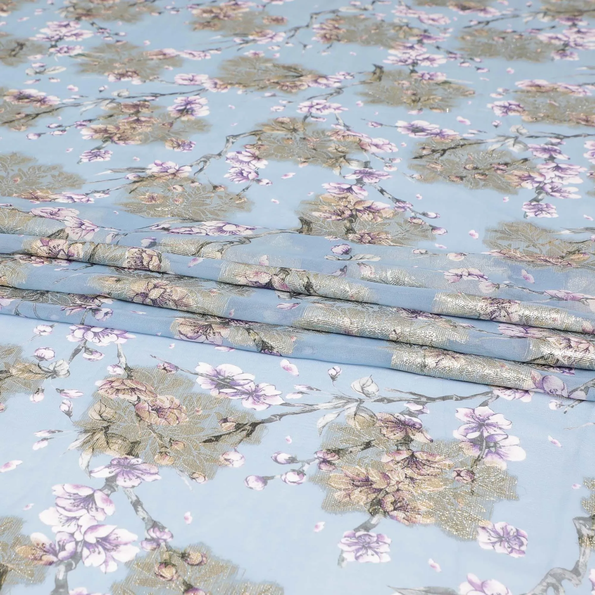 Blizzard blue synthetic chiffon fabric with multicolor print having gold metallic lurex in floral design-D8310